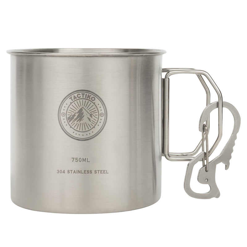 Tactiko Survival 750ml stainless steel camping mug featuring the brand logo, a foldable wire handle, and a metal carabiner clipped to the side, set against a plain white background.