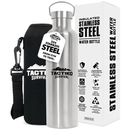 A stainless steel water bottle with a black carrying sleeve and a white retail box, shown on a plain white background. The bottle and sleeve both display the TACTIKO SURVIVAL brand name and logo.