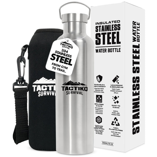 A stainless steel water bottle with a black carrying sleeve and a white retail box, shown on a plain white background. The bottle and sleeve both display the TACTIKO SURVIVAL brand name and logo.
