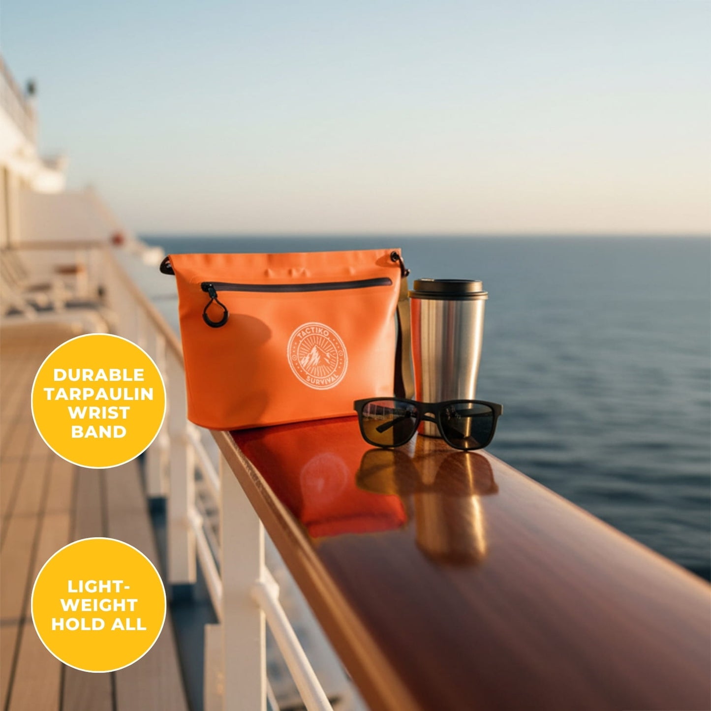 Orange waterproof pouch on boat railing