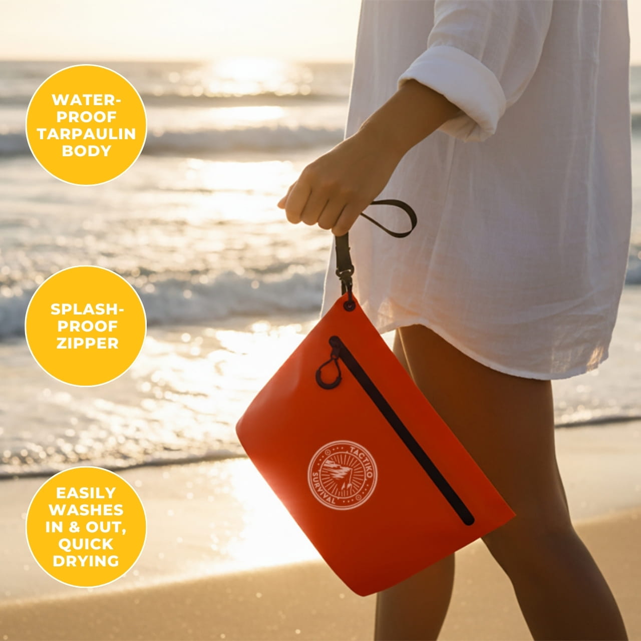 A person walking on a beach at sunset holding a red Tactiko Survival waterproof pouch, featuring yellow circular callouts that highlight key product benefits: 'Waterproof Tarpaulin Body,' 'Splash-Proof Zipper,' and 'Easily Washes In & Out, Quick Drying